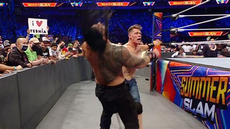 Roman Reigns def. John Cena to retain the Universal .